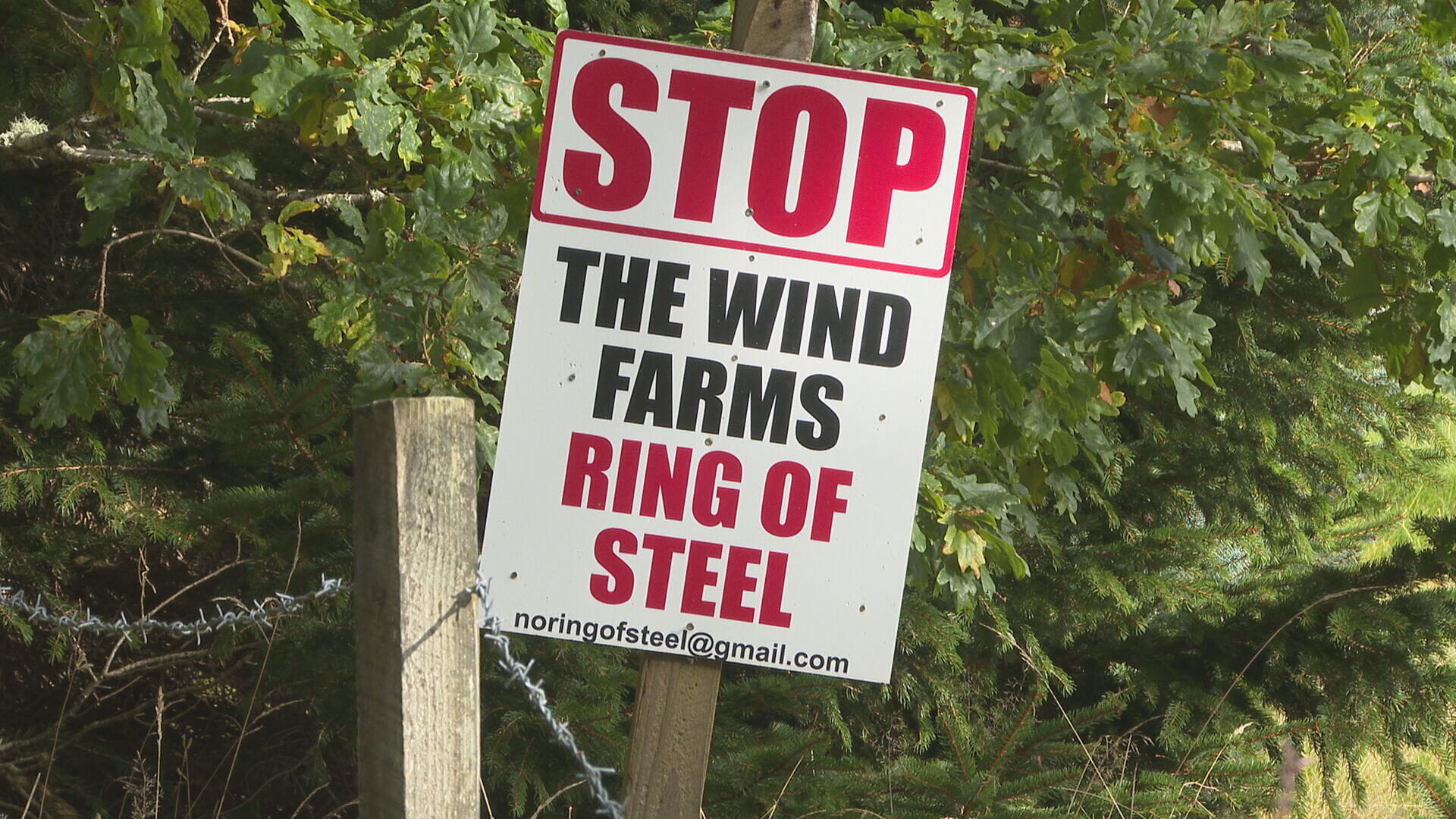 Locals have protested the wind farm plan which would see village 'encircled by turbines'
