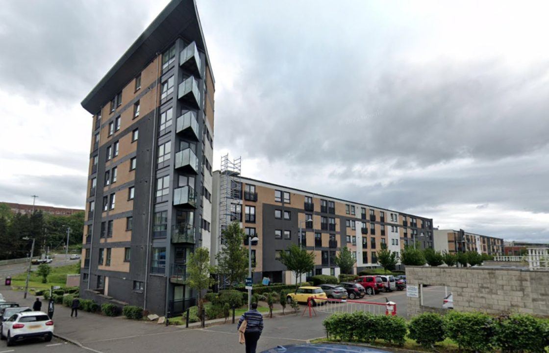 Drugs worth more than £160,000 and £80,000 in cash discovered by police at Glasgow property