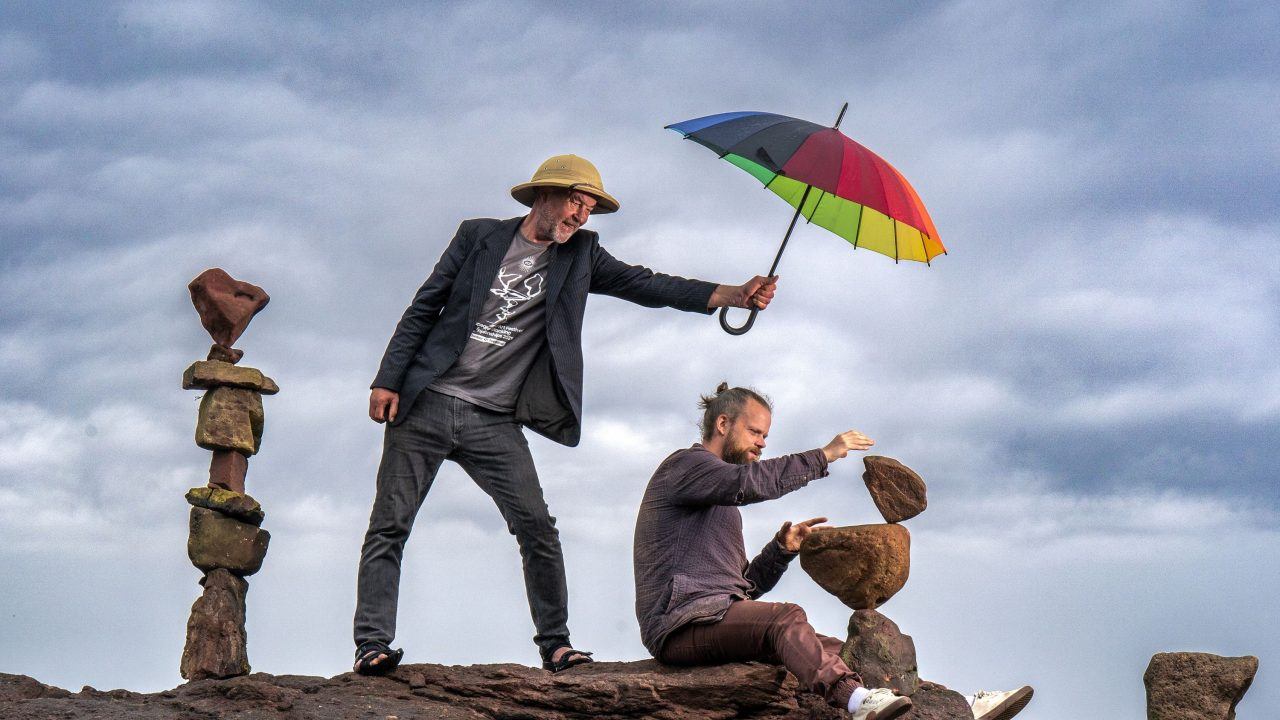 Artists James Craig Page (left) and Pontus Jansson balancing rocks on Bayswell Beach in Dunbar.