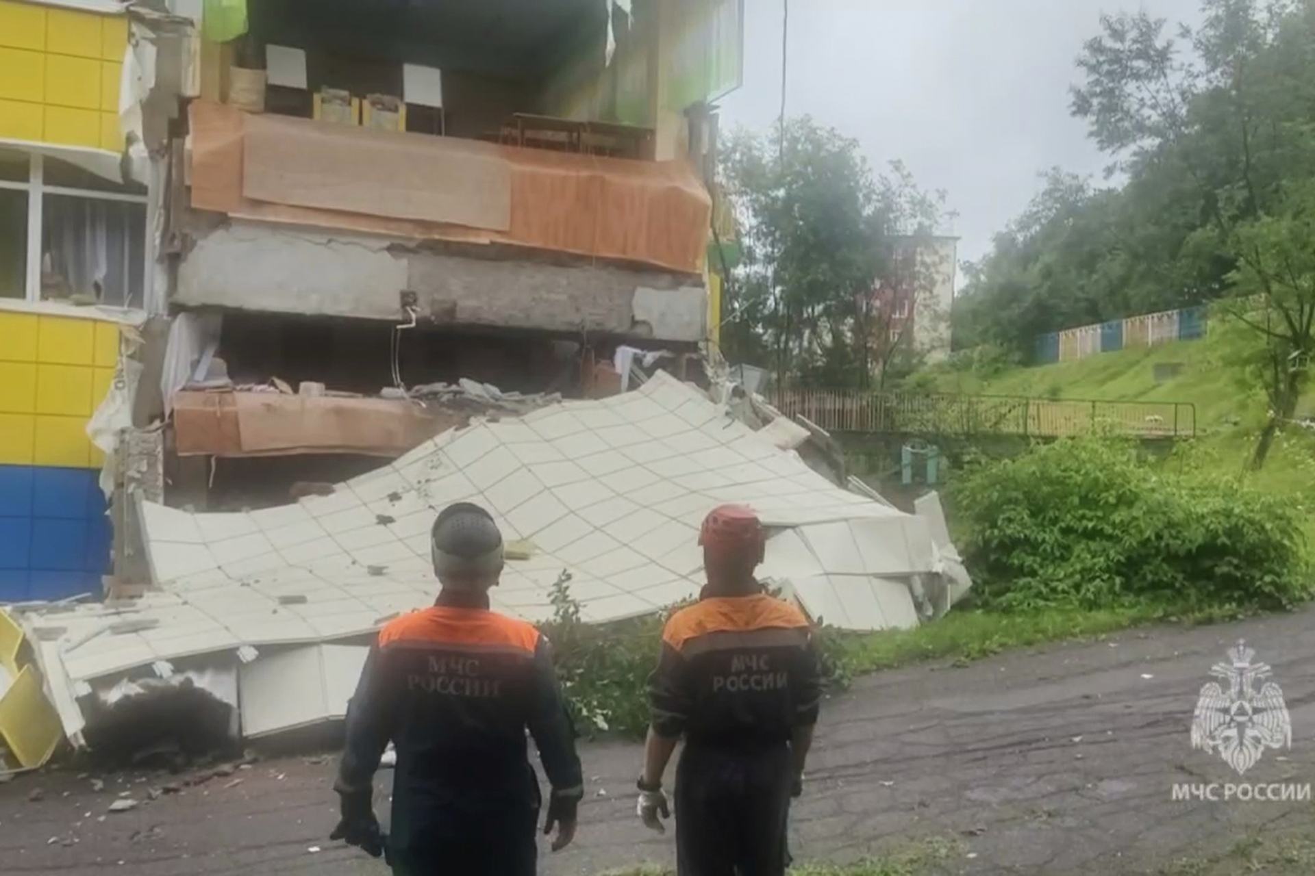 In this image taken from a video released by the Russian Emergency Ministry Press Service, rescuers inspect a kindergarten damaged by an earthquake in Petropavlovsk-Kamchatsky, Russia (Russian Emergency Ministry Press Service/AP).
