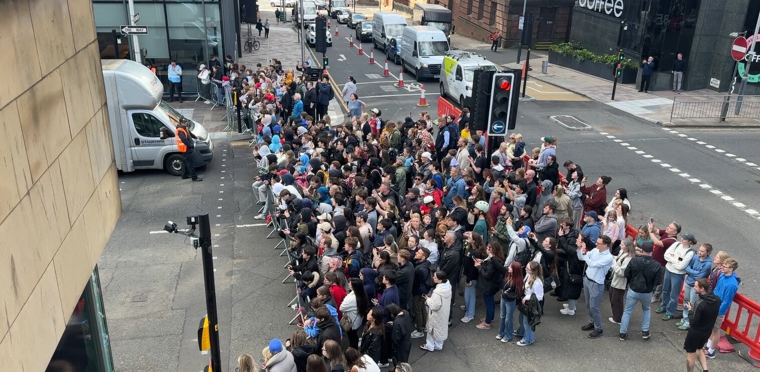 Fans lined the streets to catch a glimpse of the action.