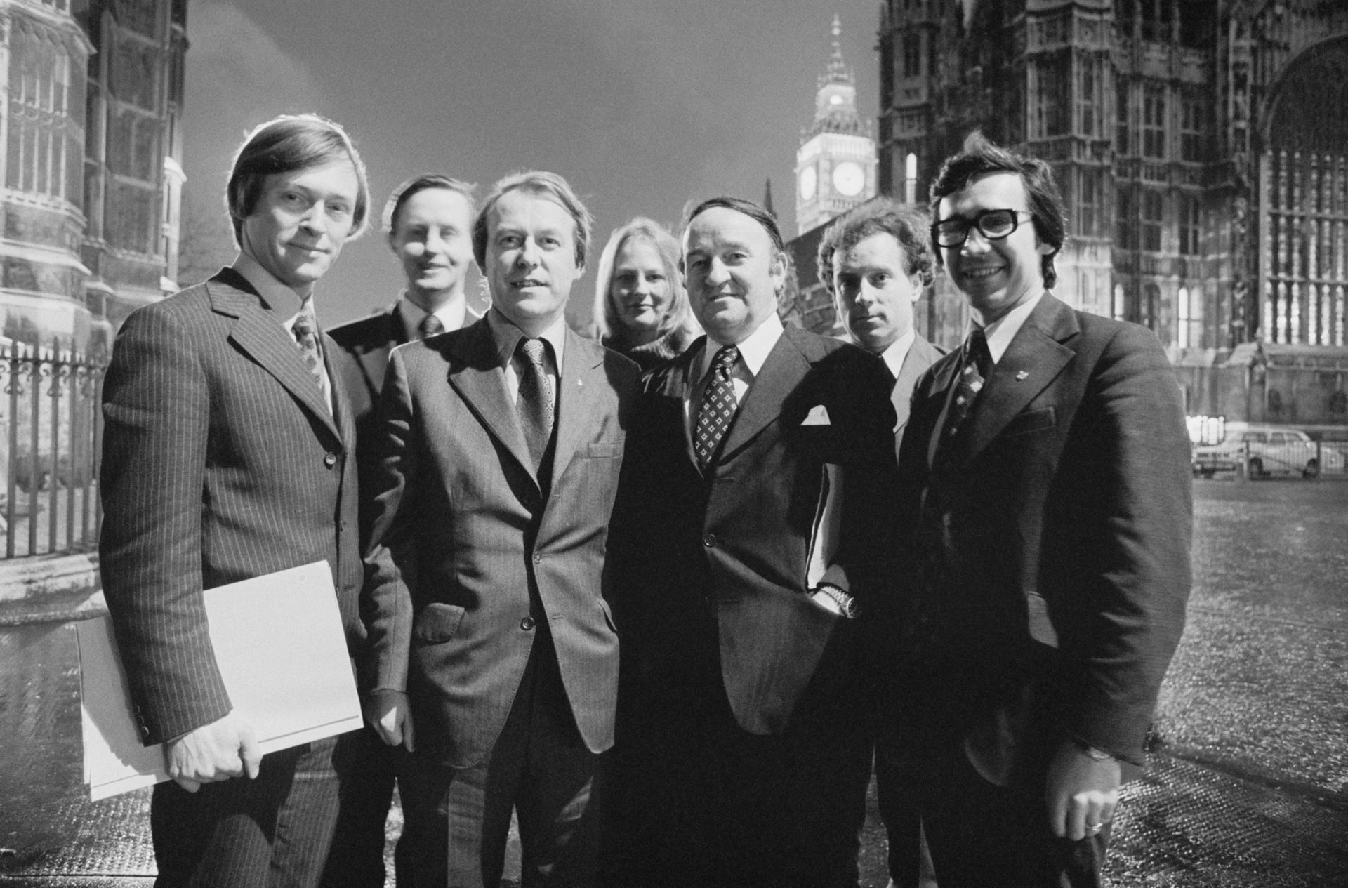 SNP MPs outside Westminster in March 1975: (L-R) George Reid, Gordon Wilson (1938 - 2017), Douglas Henderson (1935 - 2006), Margaret Ewing (1945 - 2006), Hamish Watt (1925 - 2014), Douglas Crowford (1939 - 2002), Andrew Walsh. (Photo by Evening Standard/Hulton Archive/Getty Images)