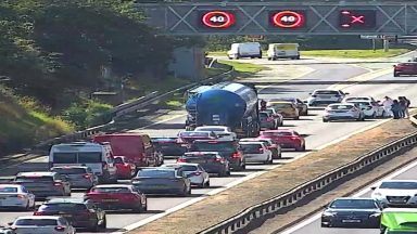 Delays on busy motorway following three-vehicle crash