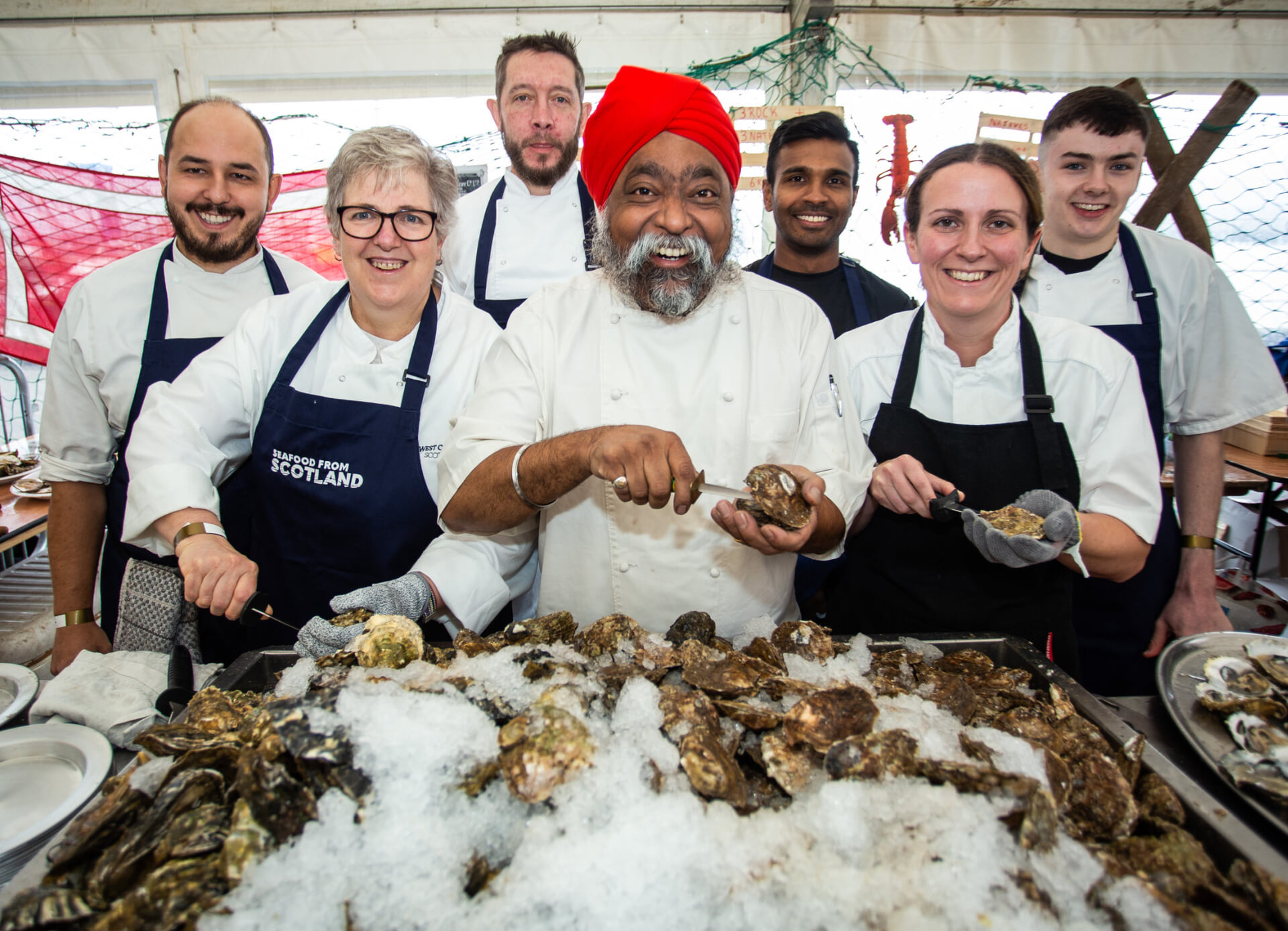 Tony Singh with the Shuck Off Competitors at the Stranraer Oyster Festival 2024.