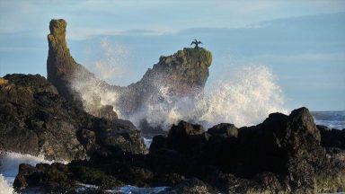Man and woman rescued  after becoming stranded on rock near Aberdeenshire beach