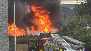 Fire crews battle blaze in Inverkeithing car park after vans destroyed 