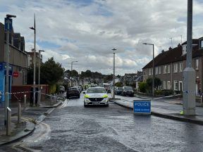 Man arrested after disturbance at Edinburgh property closes road