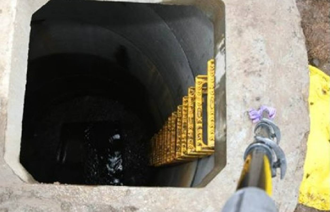 The ten-year-old fell 20ft down a manhole shaft.
