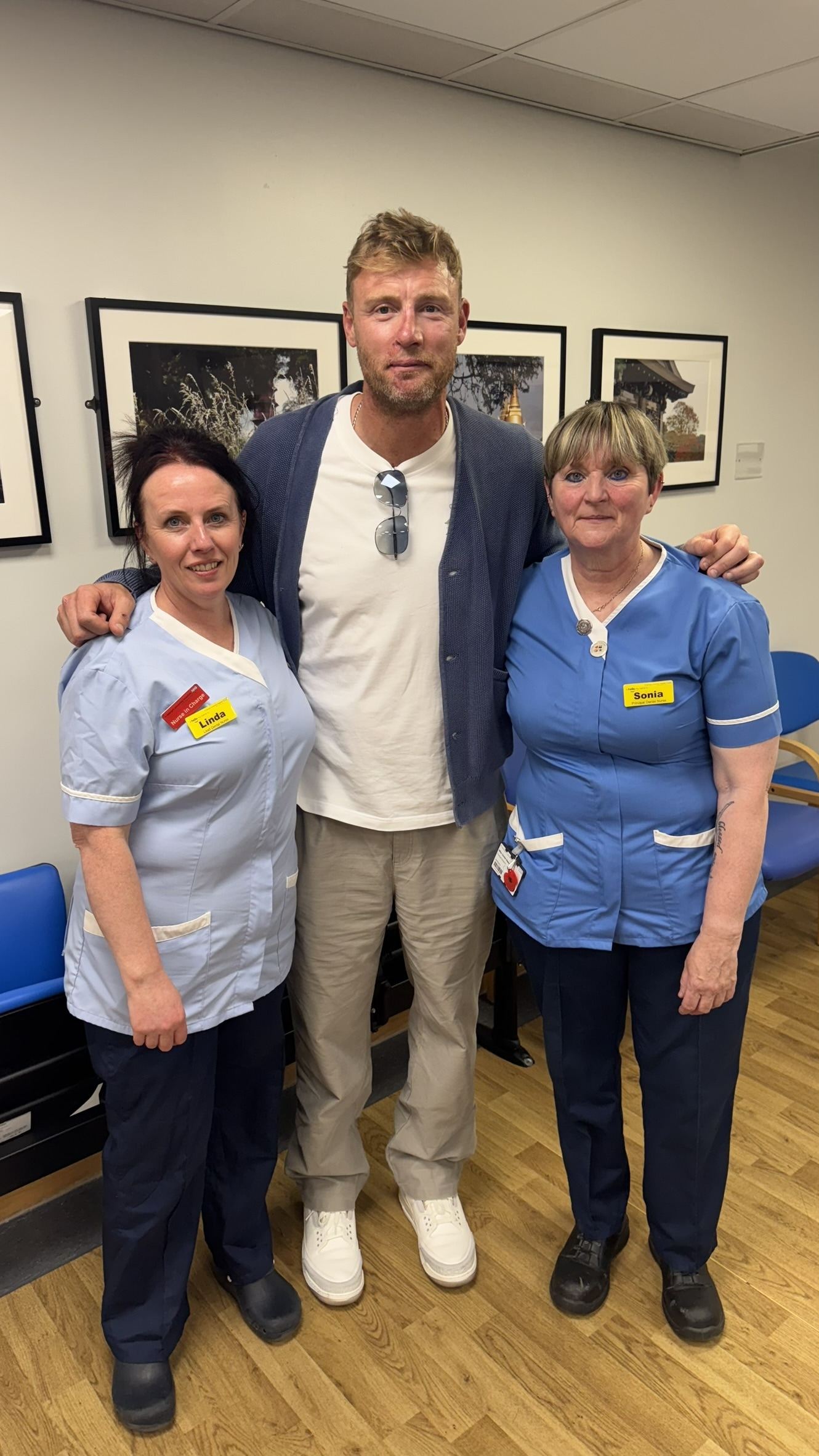 Andrew Flintoff with Linda Holden, lead dental nurse (left) and Sonia Steer, principal orthodontic nurse (right) at St George’s (St George’s University Hospitals NHS Foundation Trust/PA).