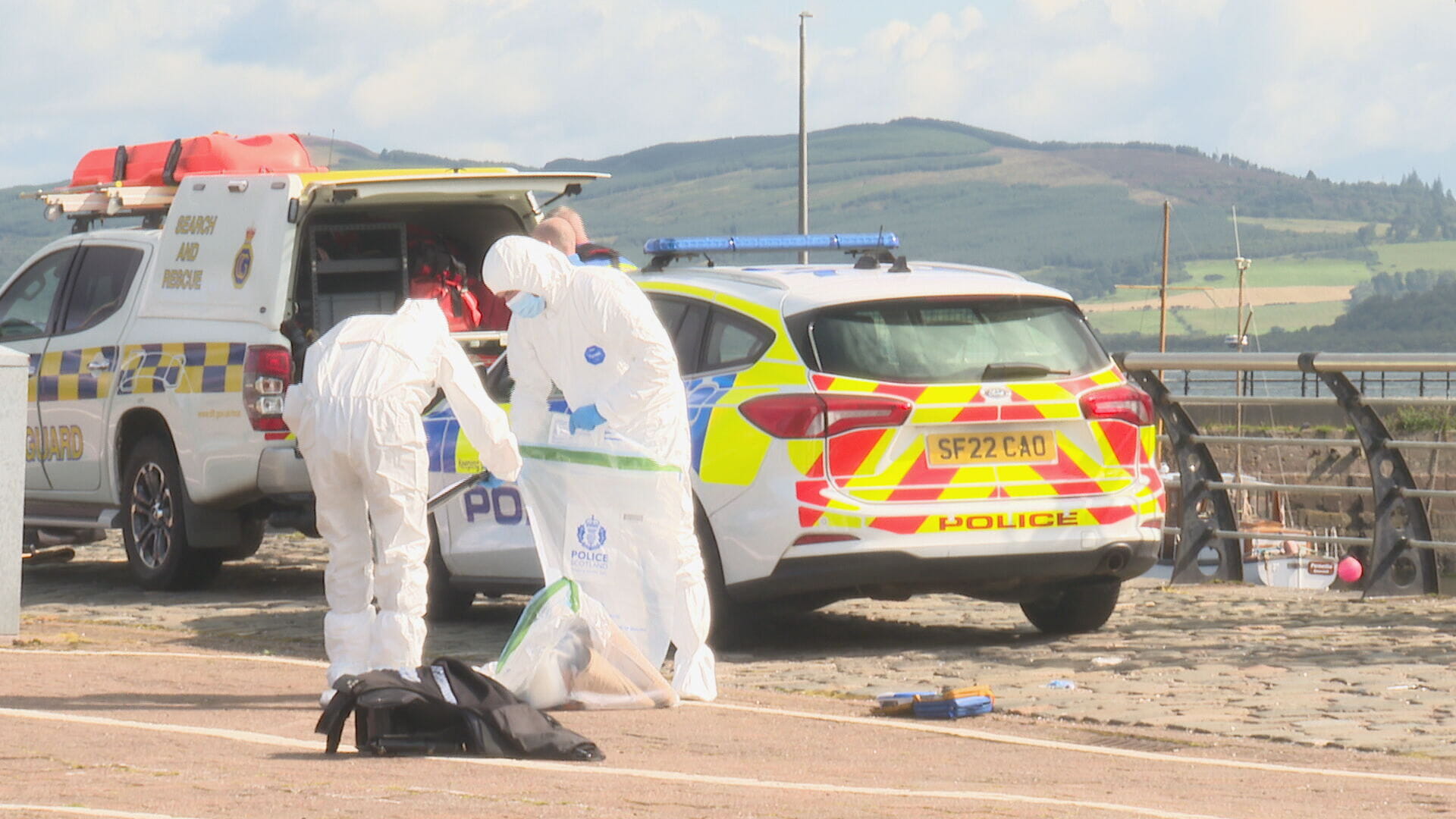 Forensics on the scene at Greenock harbour.