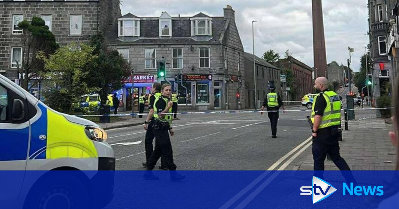 Two arrested after armed police and negotiators sent to disturbance in ...