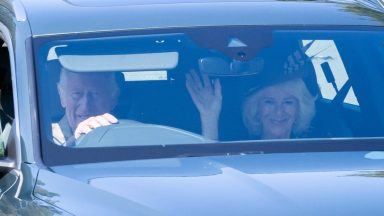 Charles drives Camilla to Sunday church service in Scotland