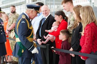 King visits Scotland’s main RAF base and thanks families for their sacrifices