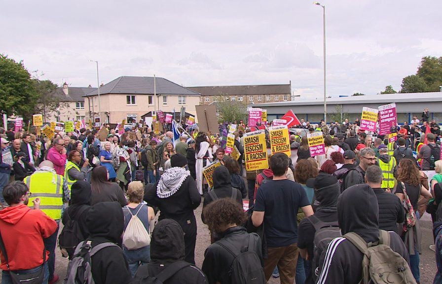 Hundreds gather for protests outside hotel housing asylum seekers in ...