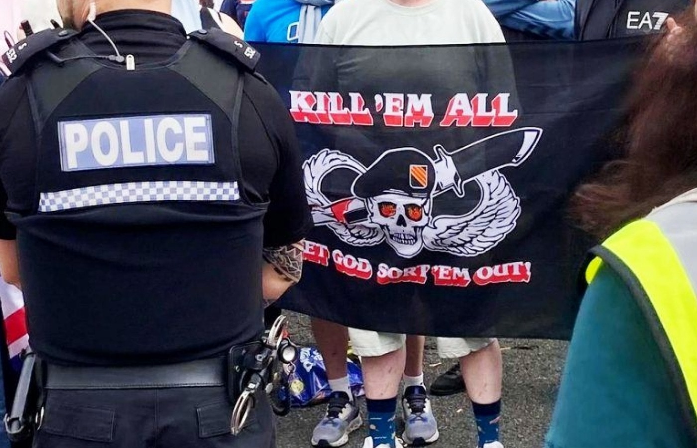 Two demonstrators outside the Cladhan Hotel were seen carrying a banner that read: 'Kill ’em all, Let god sort ’em out'.