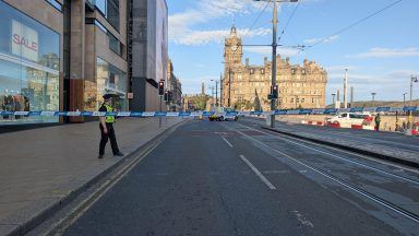 Edinburgh city centre street taped off after ‘youths throw items from roof’