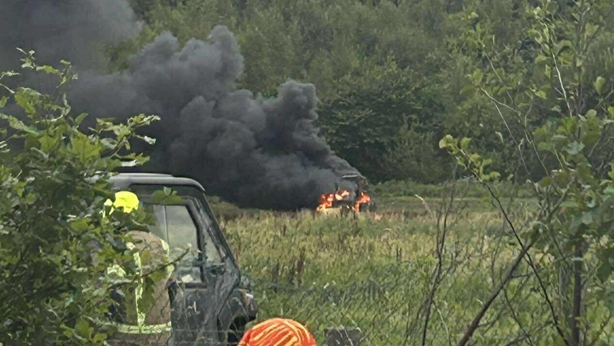 Thick black smoke was pictured billowing from the tractor.
