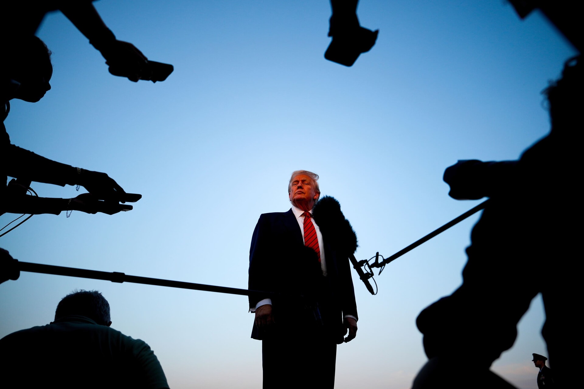 US President Donald Trump speaking to reporters before boarding Air Force One at Lehigh Valley International Airport in Pennsylvania on Sunday.