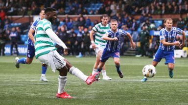 Kelechi Iheanacho scores late penalty on debut as Celtic win amid fans’ protest