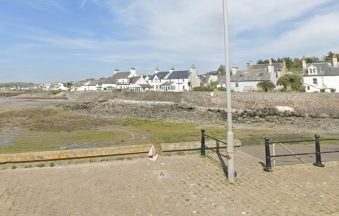 Woman, 94, airlifted to hospital after car goes over wall and onto rocks at Port William harbour