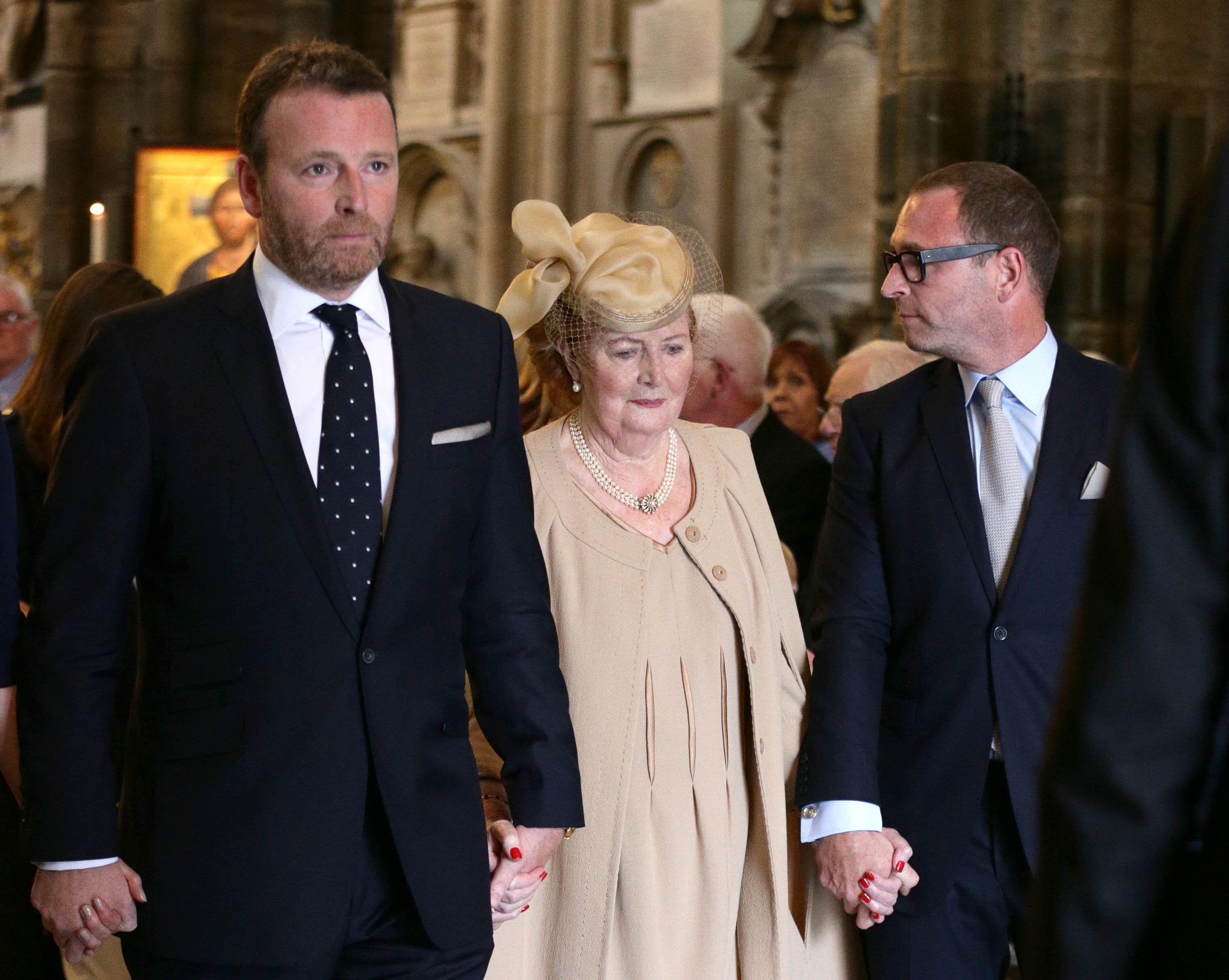 Helen Wogan the widow of Sir Terry Wogan, with their sons Alan (left) and Mark.
