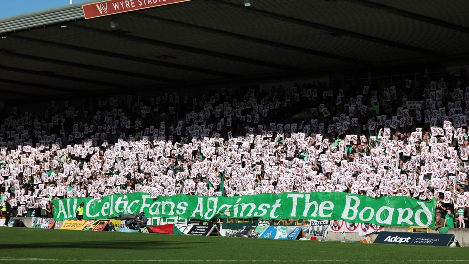 Celtic supporters protest against the board at Firhill.