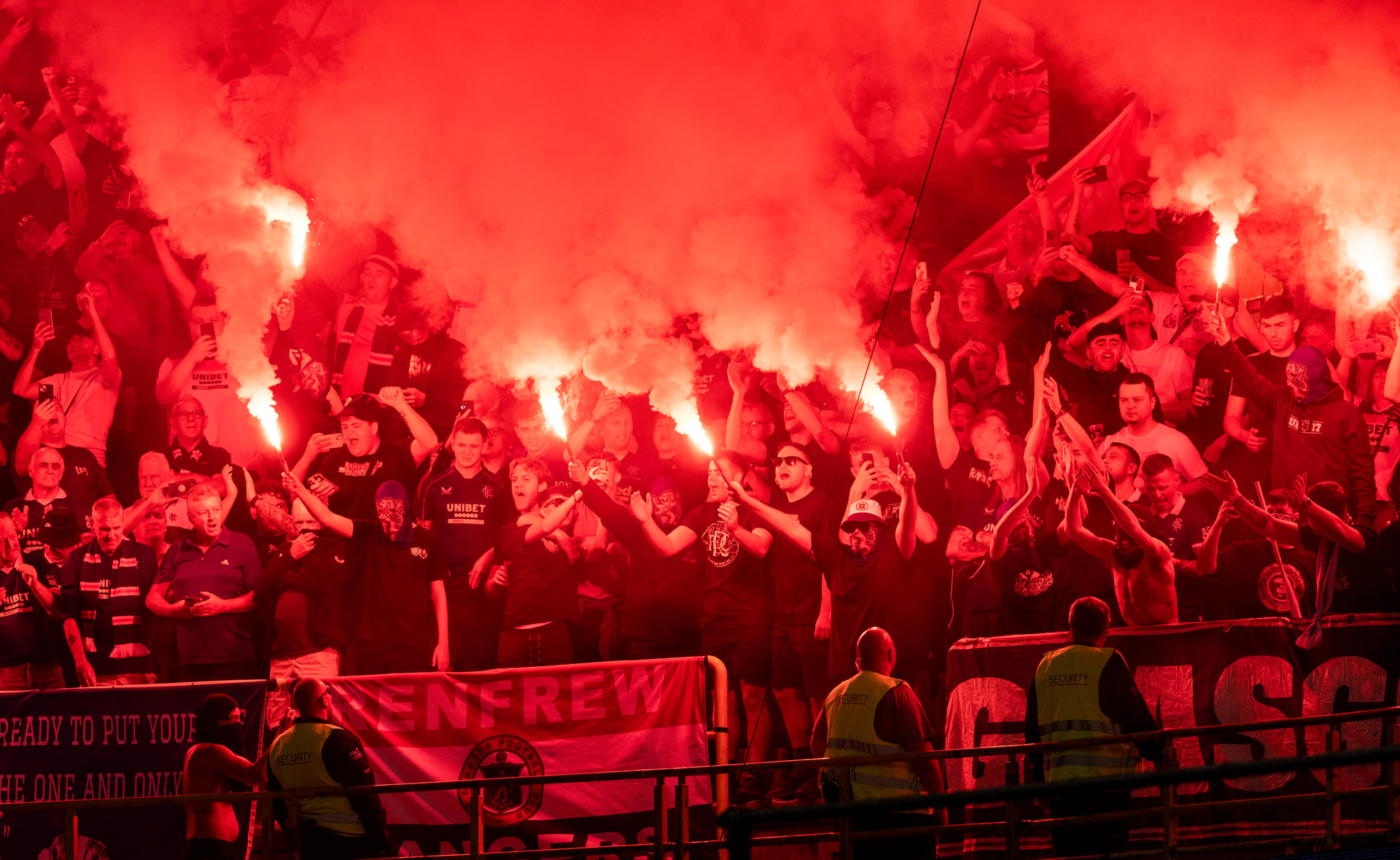 BRUGES, BELGIUM - AUGUST 27: Rangers fans hold up pyrotechnics during a UEFA Champions League Play-Off Round Second Leg between Club Brugge and Rangers at the Jan Breydel Stadium, on August 27, 2025, in Bruges, Belgium. (Photo by Craig Foy / SNS Group)