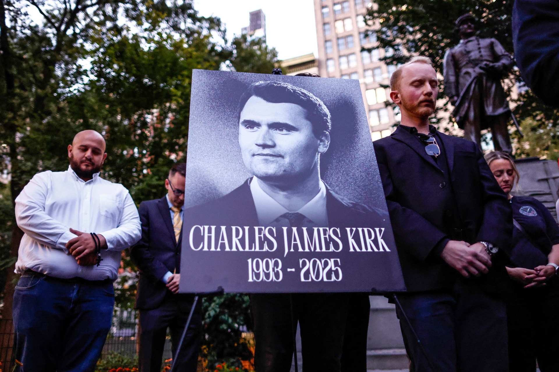 Members of the New York Young Republicans Club during a minute’s silence for Charlie Kirk during a vigil in New York.