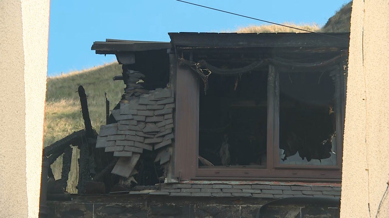 Road closed for ten days after Gardenstown home engulfed by flames as woman still missing