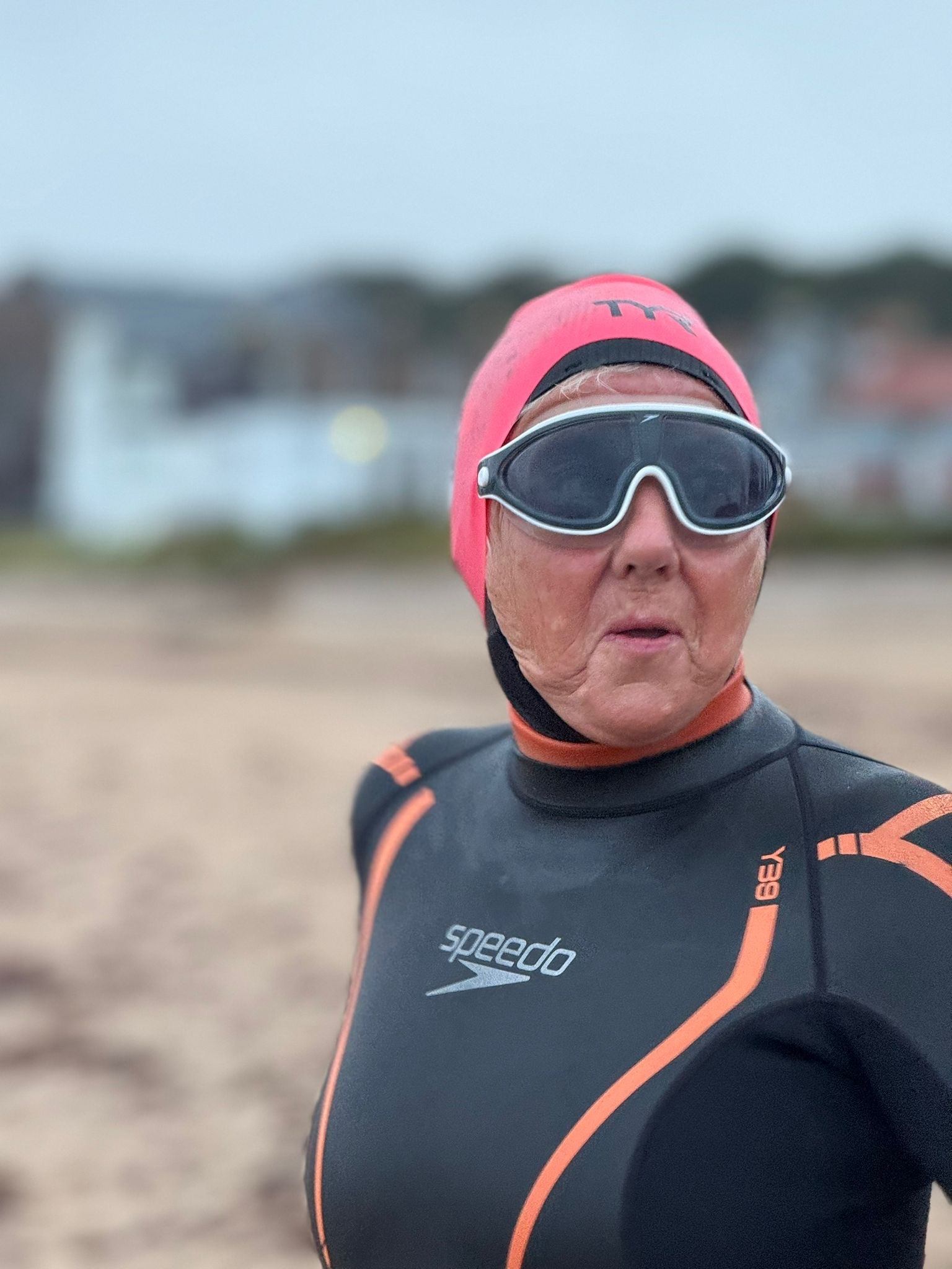 Linda Malcolm dodged seals, a shipping tanker, and jellyfish "the size of dogs" to complete the 15km journey across the Firth of Forth in just over six hours on Wednesday.