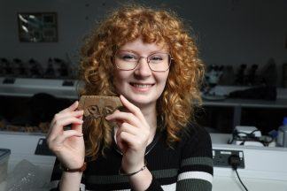 Archaeology student unearths rare stone carving that may show Pictish face