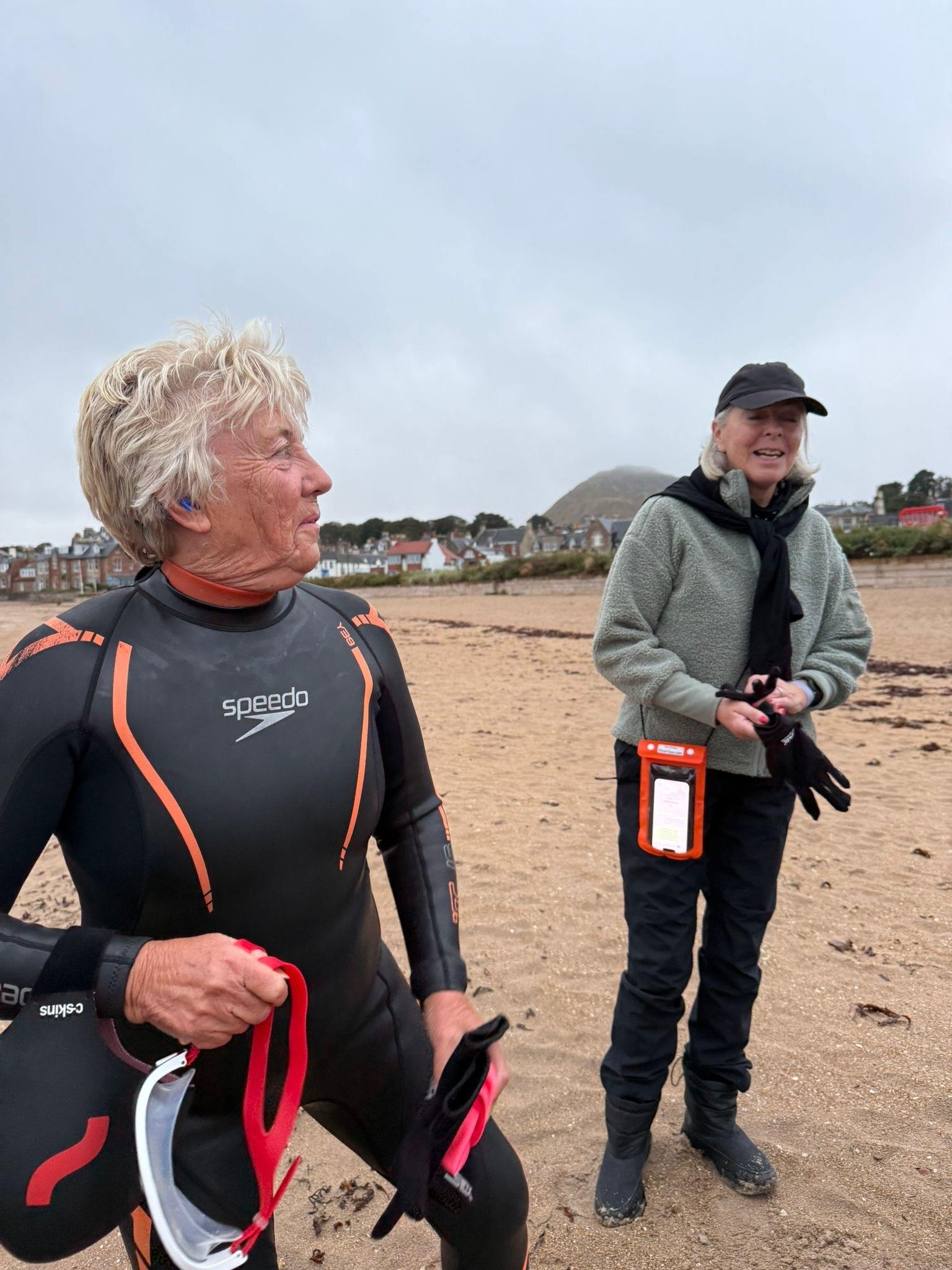 Linda Malcolm dodged seals, a shipping tanker, and jellyfish "the size of dogs" to complete the 15km journey across the Firth of Forth in just over six hours on Wednesday.