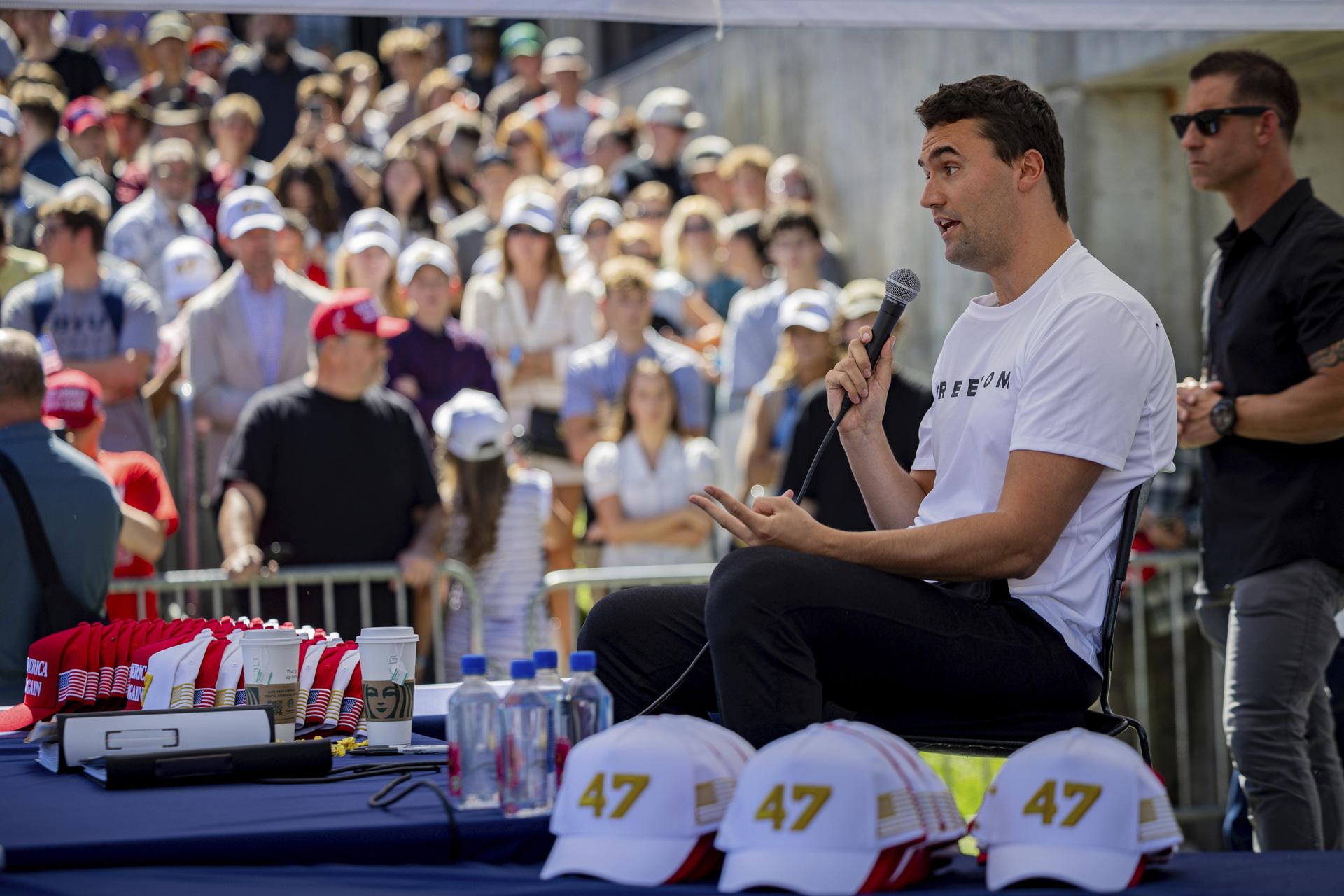 Charlie Kirk speaks before he is shot during Turning Point’s visit to Utah Valley University in Orem (Tess Crowley/The Deseret News via AP).