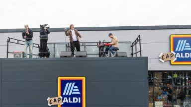 Lewis Capaldi delights fans with surprise gig on Aldi store roof