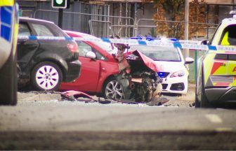 Three in hospital after three-car crash at Dundee roundabout