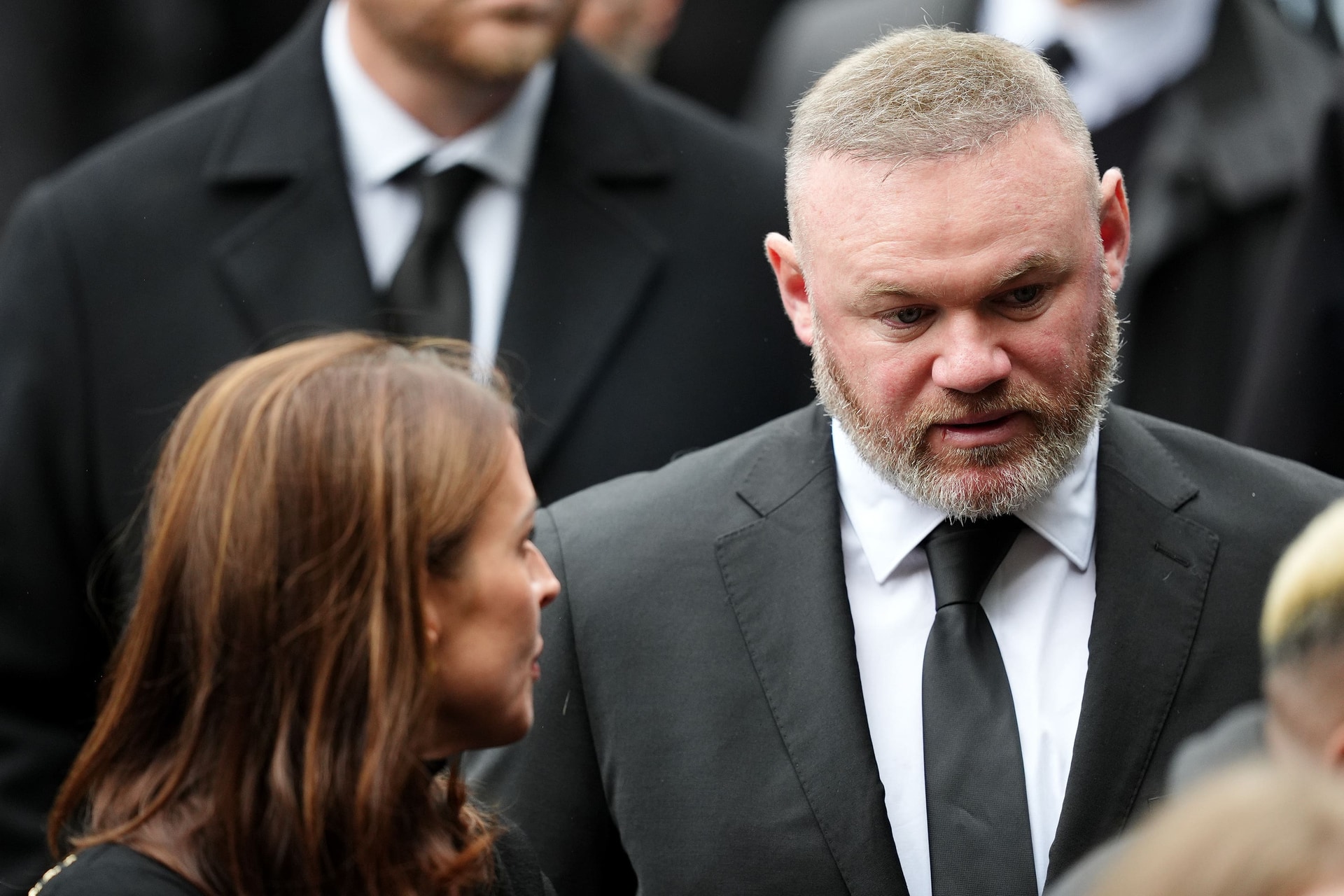 Wayne Rooney and his wife Coleen were among the mourners at Manchester Cathedral