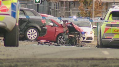 Three in hospital after three-car crash at Dundee roundabout