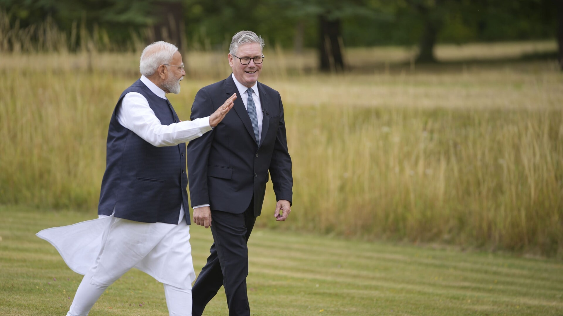 Prime Minister Sir Keir Starmer with Narendra Modi.