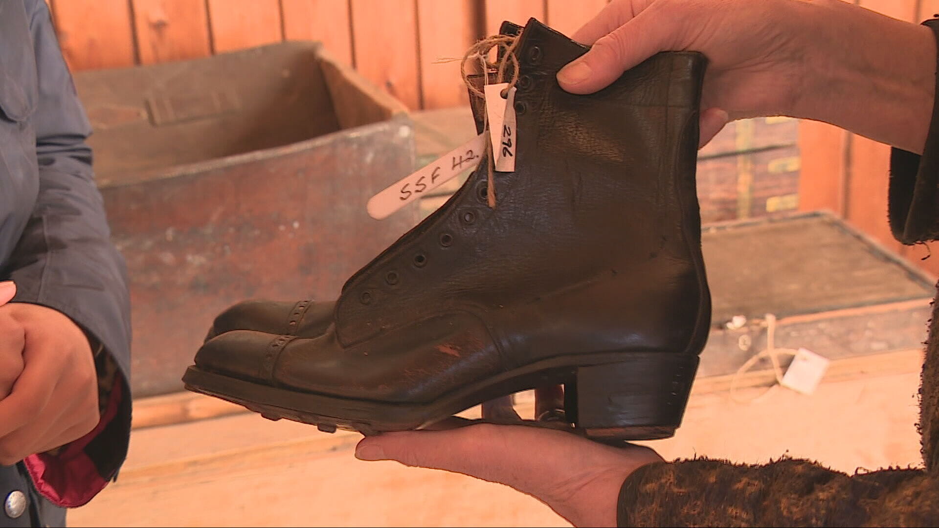 A pair of boots left at the shop