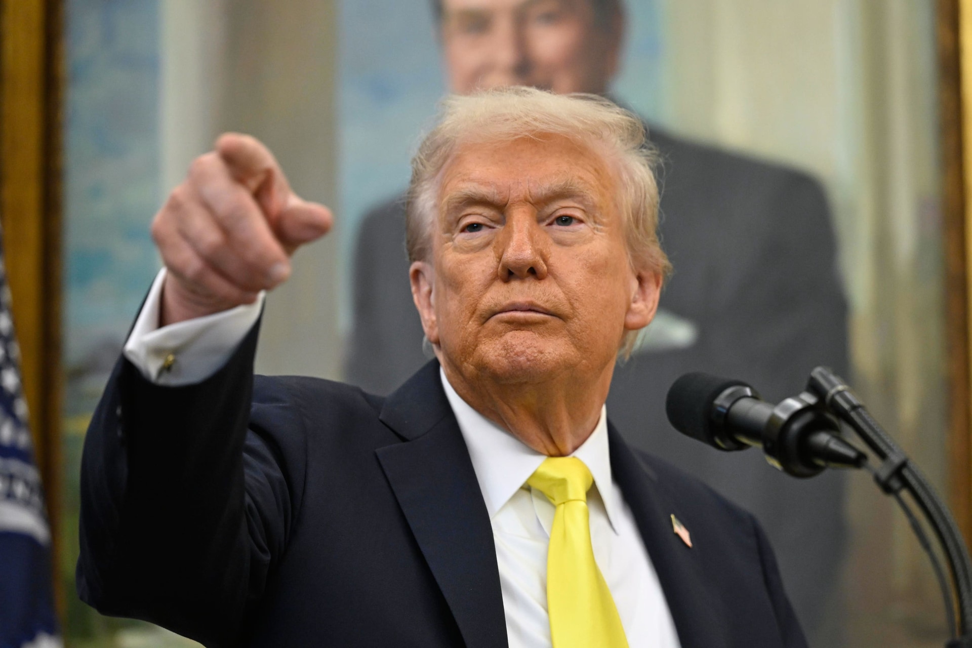 President Donald Trump speaks during an event in the Oval Office at the White House in Washington (John McDonnell/AP).