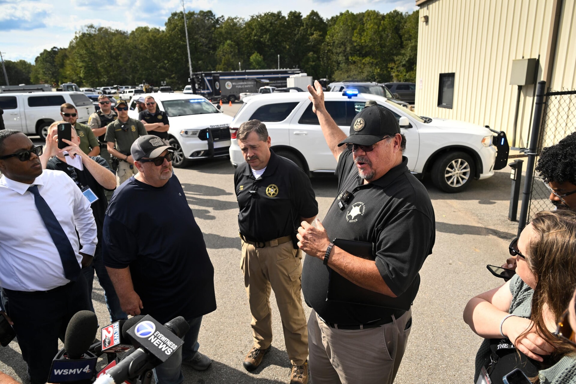 Humphreys County sheriff Chris Davis speaks to the media.