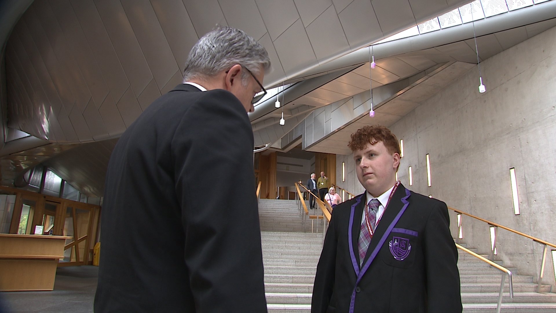 Cameron McGerr speaking with MSP Stuart McMillan