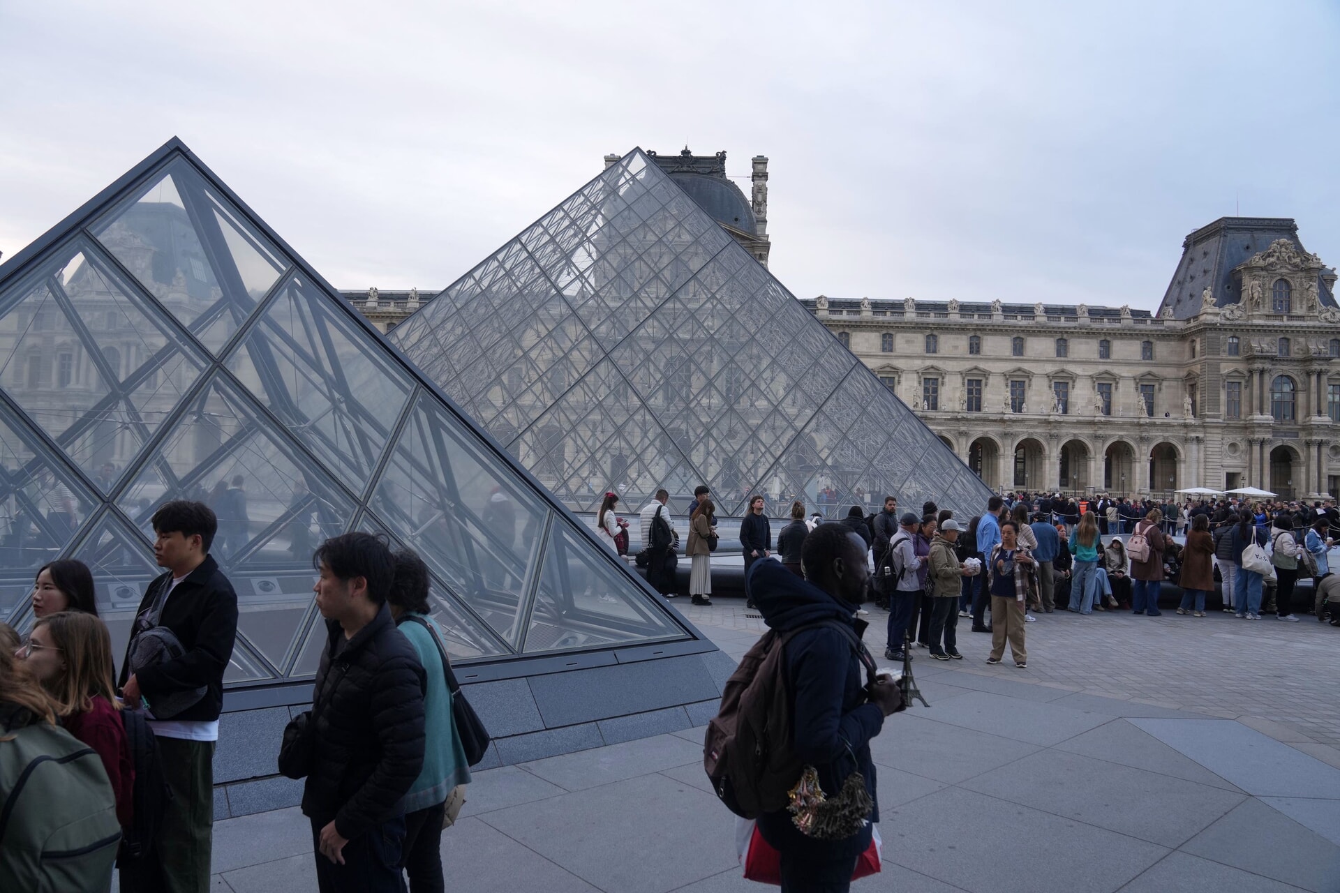 Hundreds queued outside the Louvre as the barriers came down.