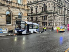 Driver in hospital after bus crashes into building on George Square in Glasgow