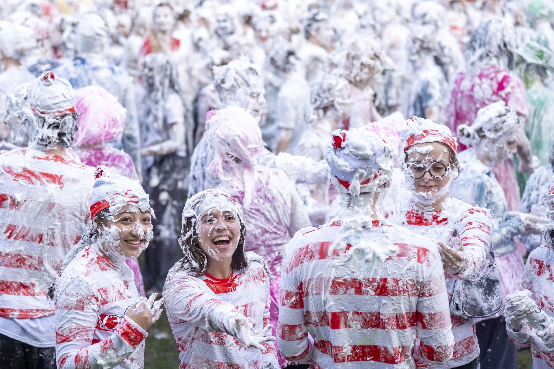 Students take part in the traditional Raisin Monday foam fight