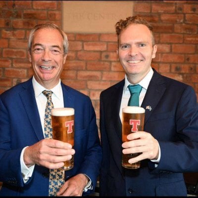 Councillor Ross Lambie, alongside Nigel Farage