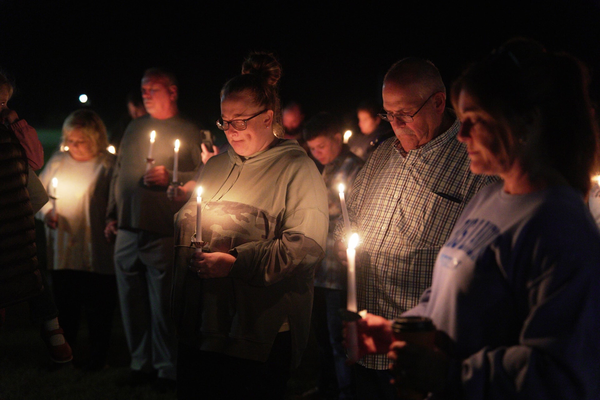 Residents attend a vigil following the blast.