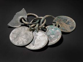 Museum staff describe ‘magical’ moment hoard’s silver colour was revealed
