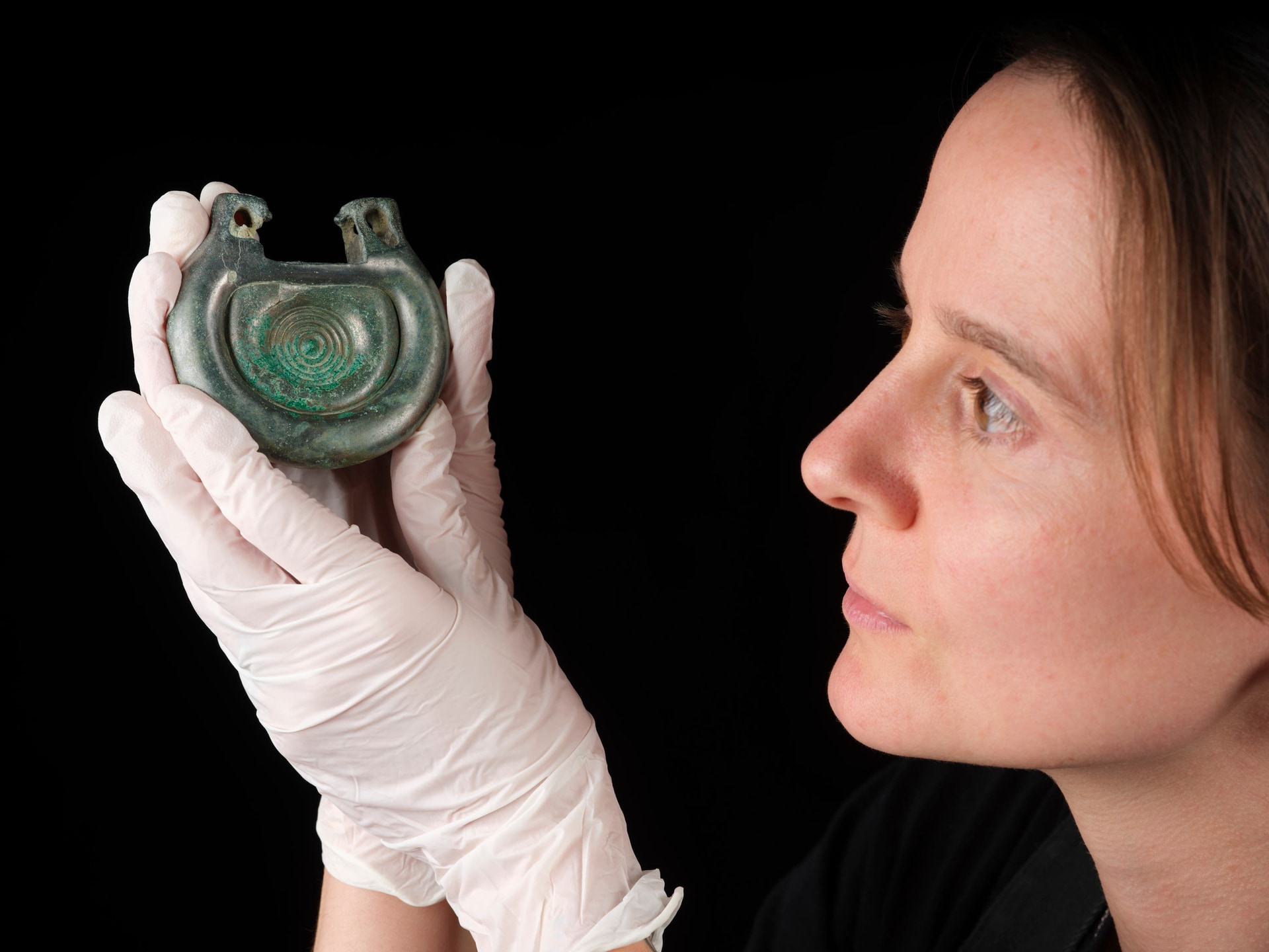 Conservator Bethan Bryan said the moment the silver colour emerged was like the revelation of a 3,000-year-old secret (National Museums Scotland/PA).