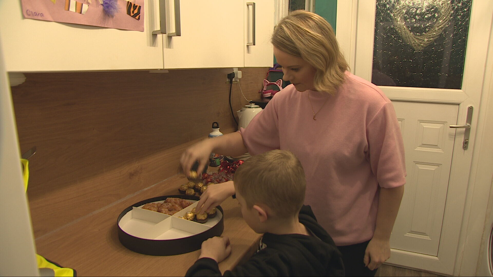 Jaxx and mum Lucy making treats for their local binmen